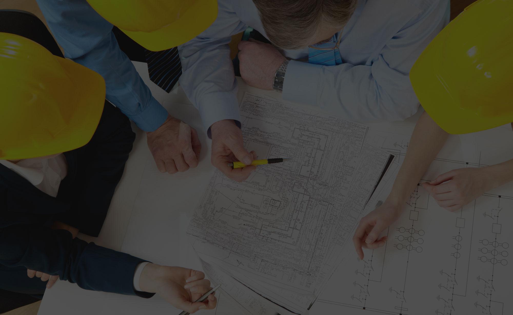 Contractors Discussing Building Plans Contractors Discussing Building Plans